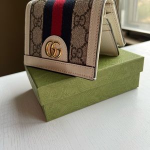 GG supreme monogram wallet